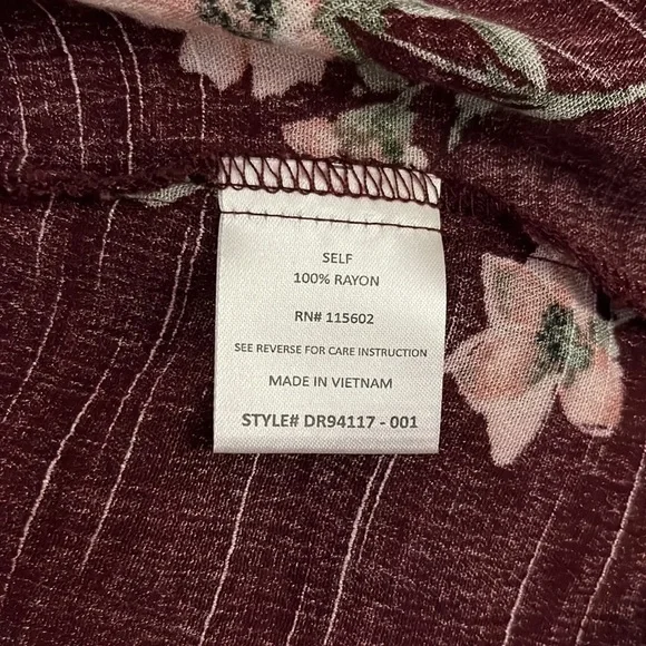 Lush eggplant colored dress with flowers. 3/4 flared sleeves. Size Medium - Picture 10 of 10